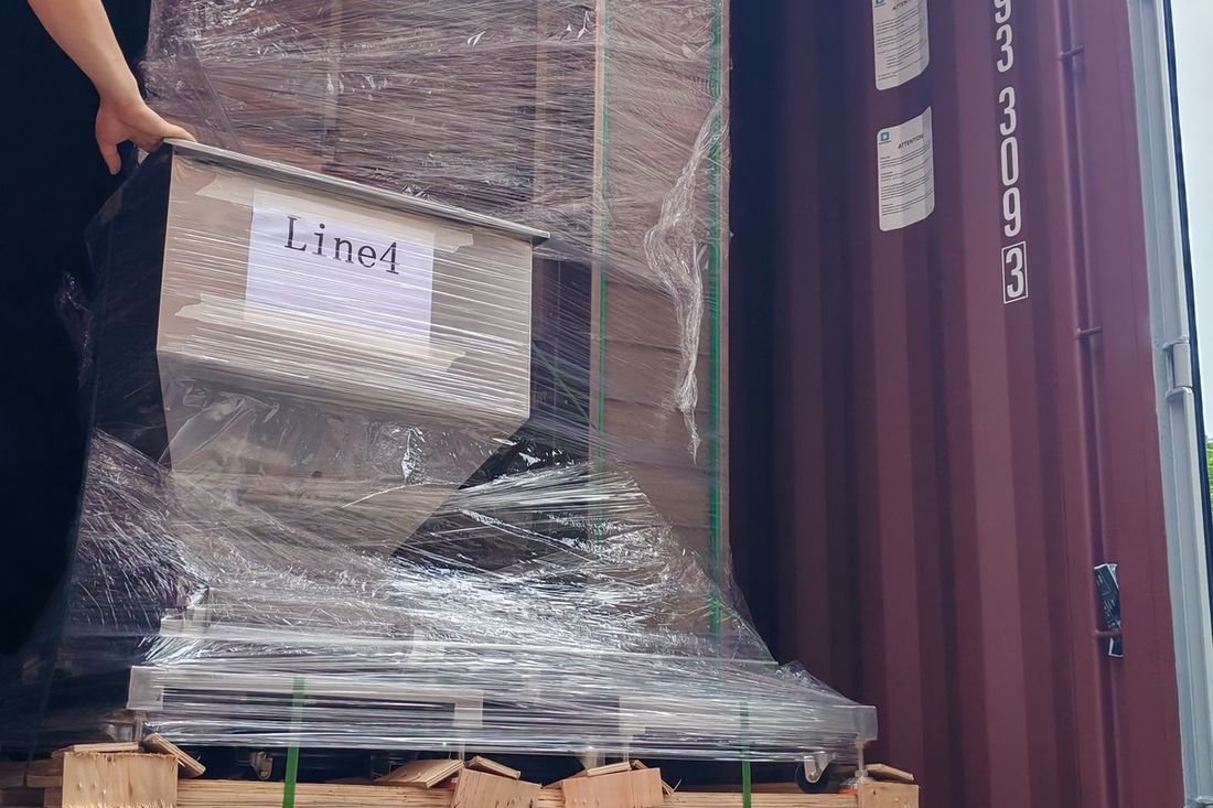 Oral-pouch line container-shipment photo