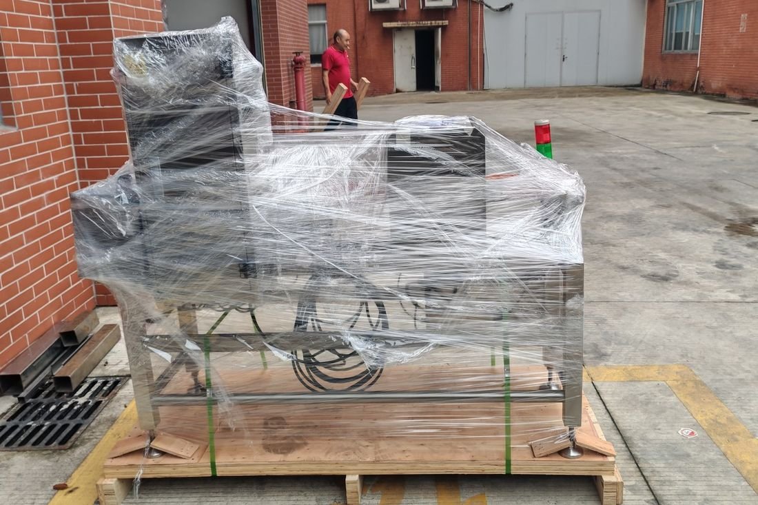 Oral-pouch line container-shipment photo