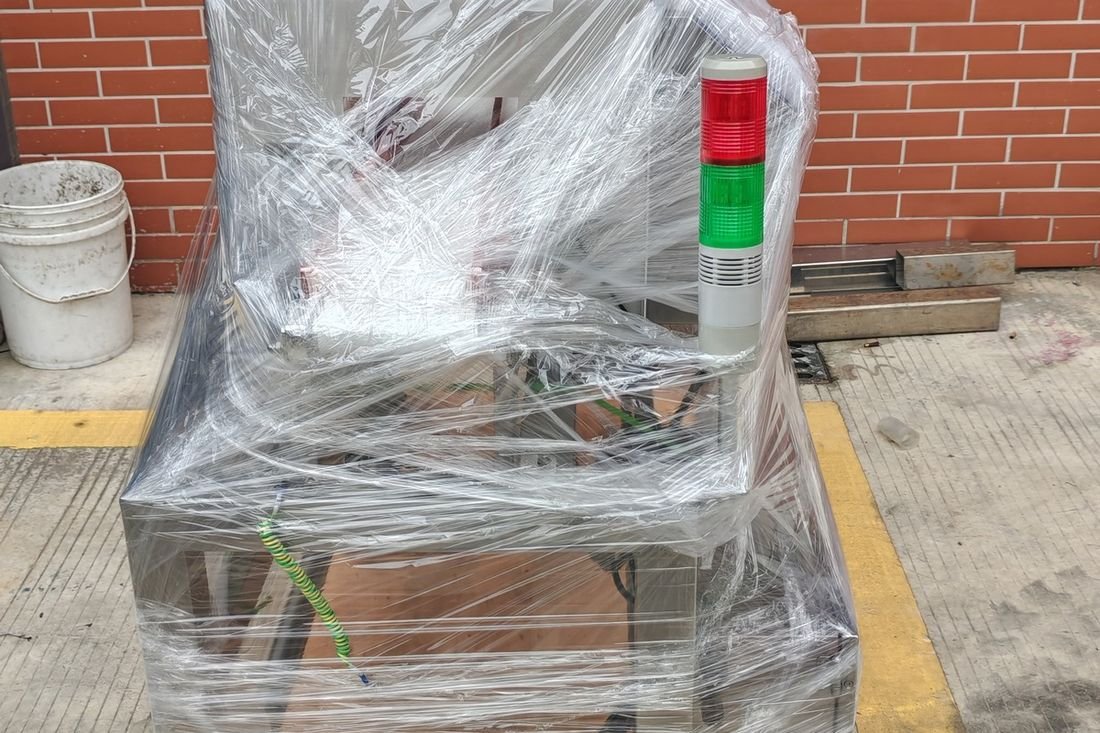 Oral-pouch line container-shipment photo
