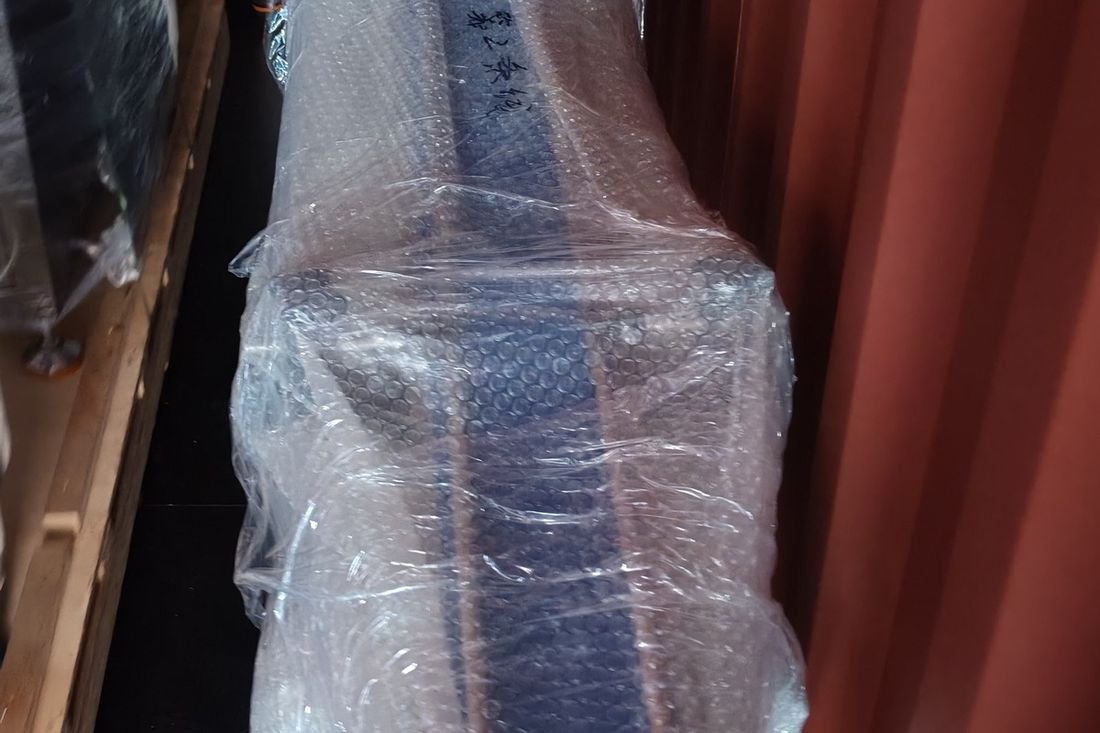 Oral-pouch line container-shipment photo