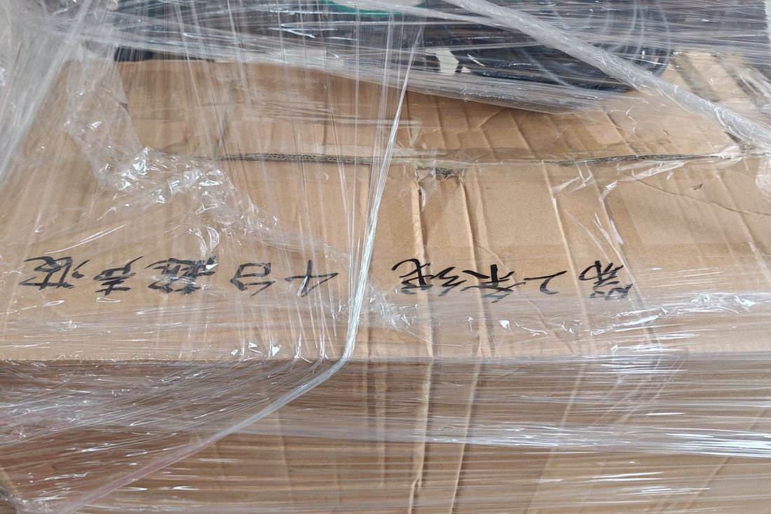 Oral-pouch line container-shipment photo