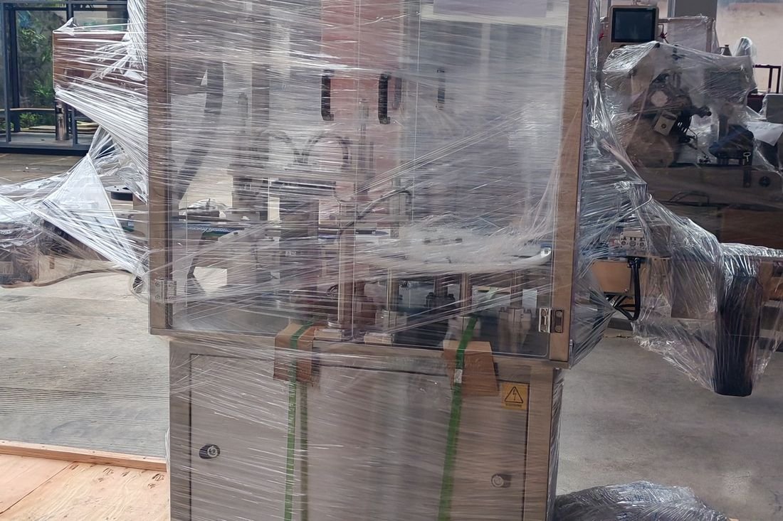 Oral-pouch line container-shipment photo