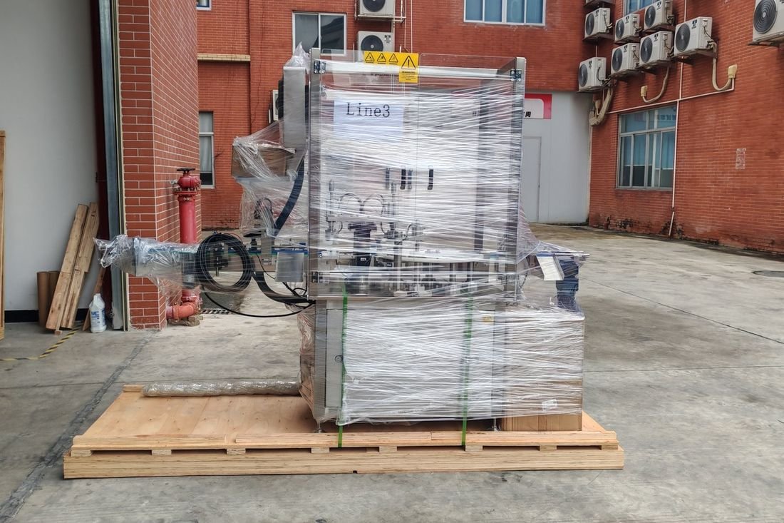 Oral-pouch line container-shipment photo