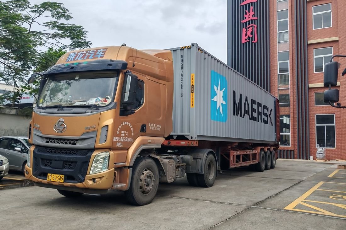 Oral-pouch line container-shipment photo
