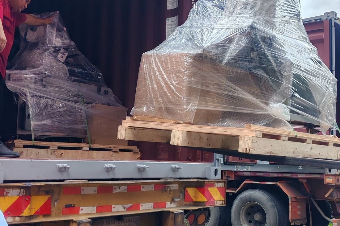 Oral-pouch line container-shipment photo
