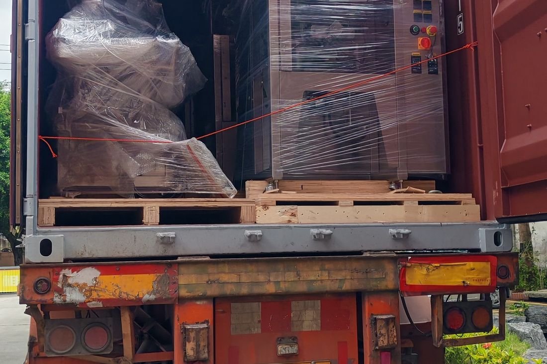 Oral-pouch line container-shipment photo