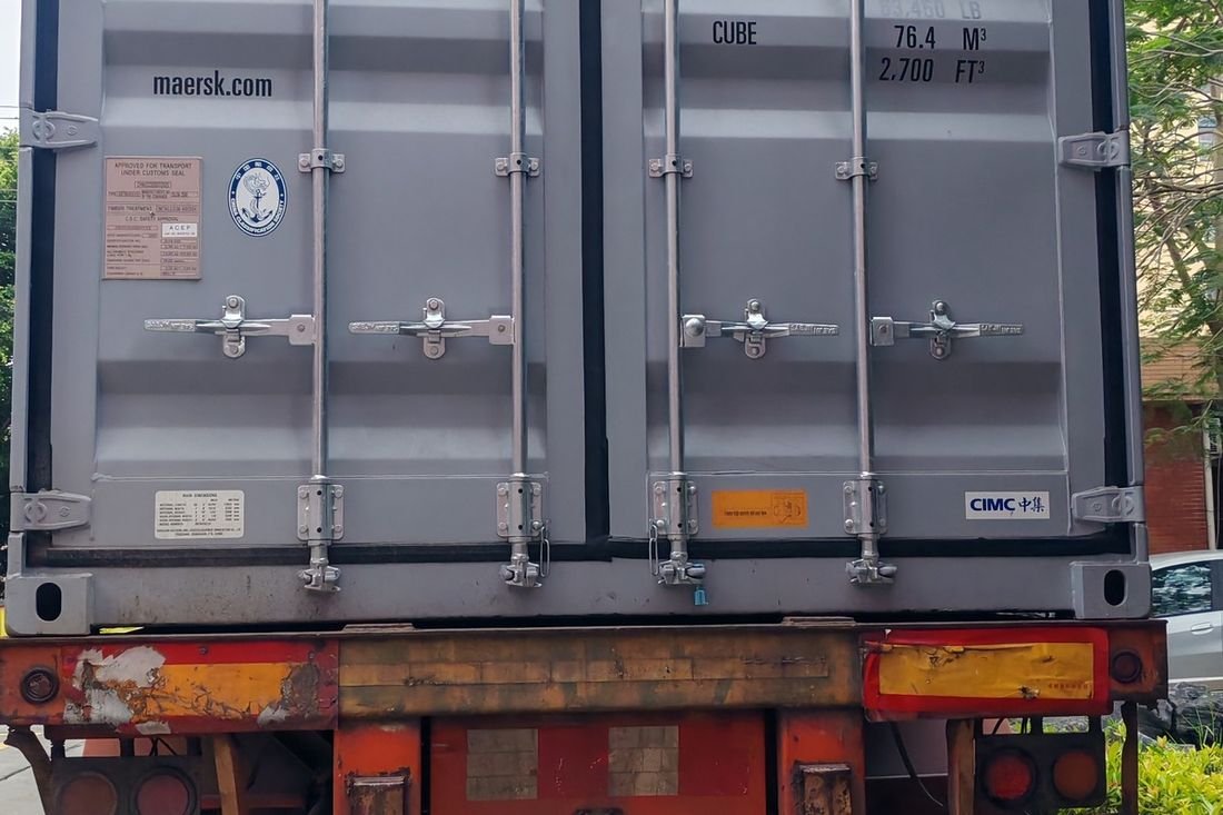 Oral-pouch line container-shipment photo
