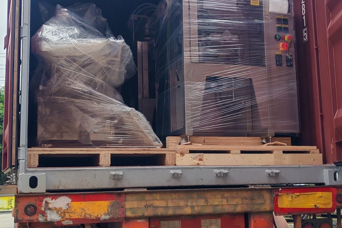 Oral-pouch line container-shipment photo