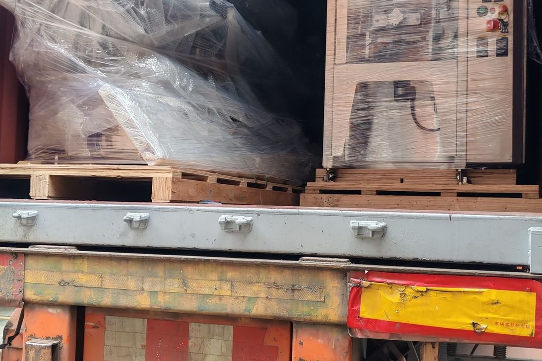 Oral-pouch line container-shipment photo
