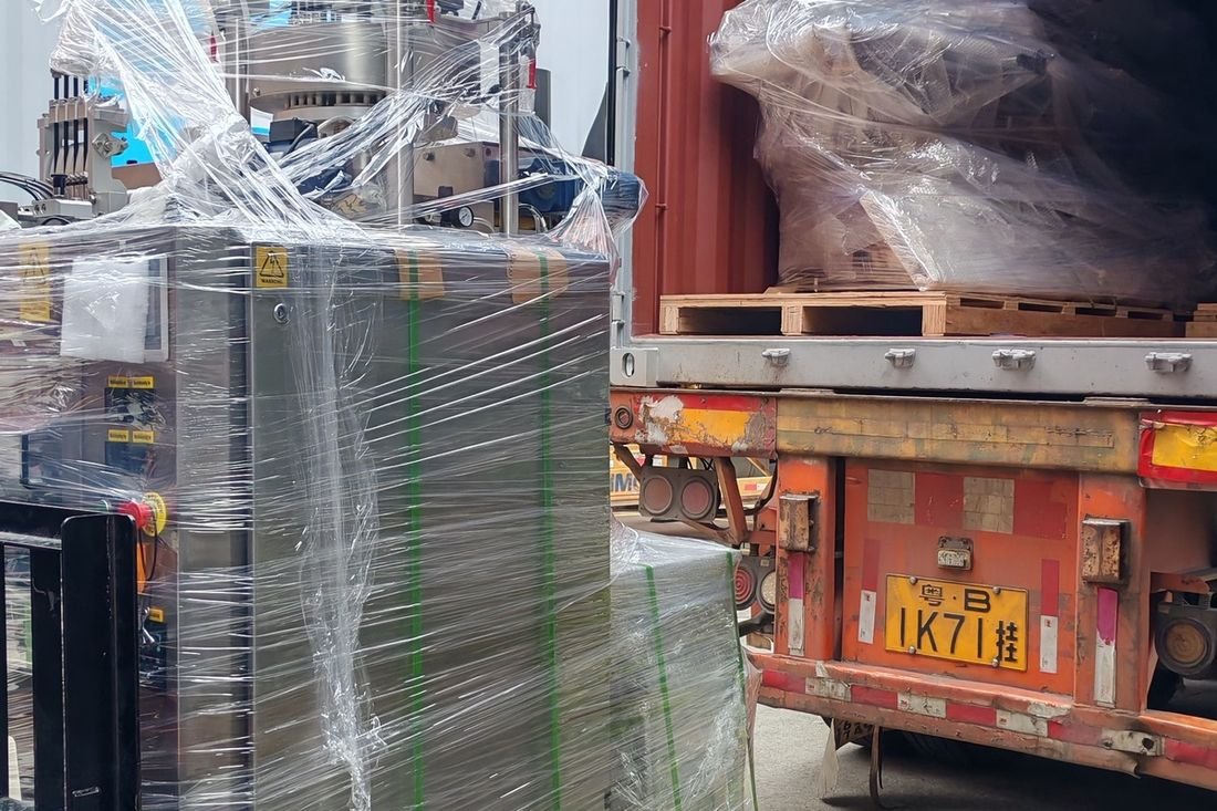 Oral-pouch line container-shipment photo