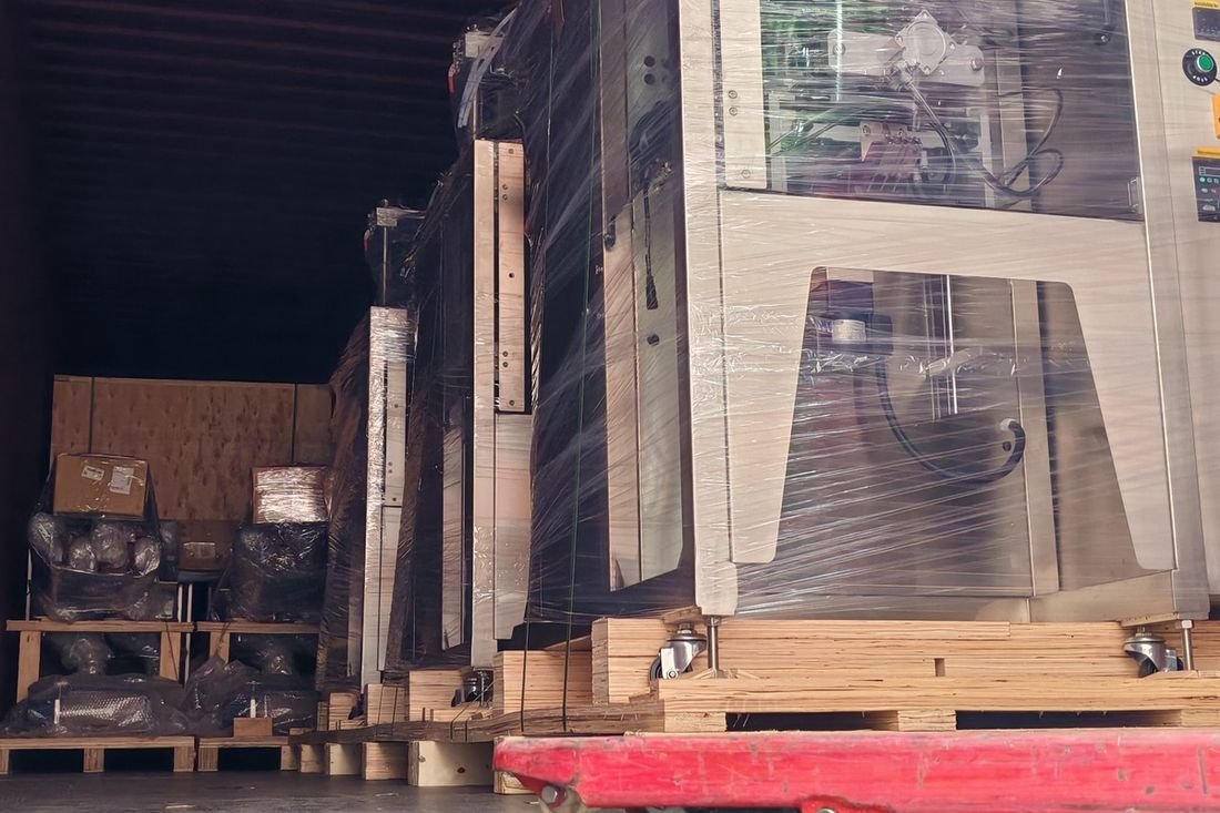 Oral-pouch line container-shipment photo