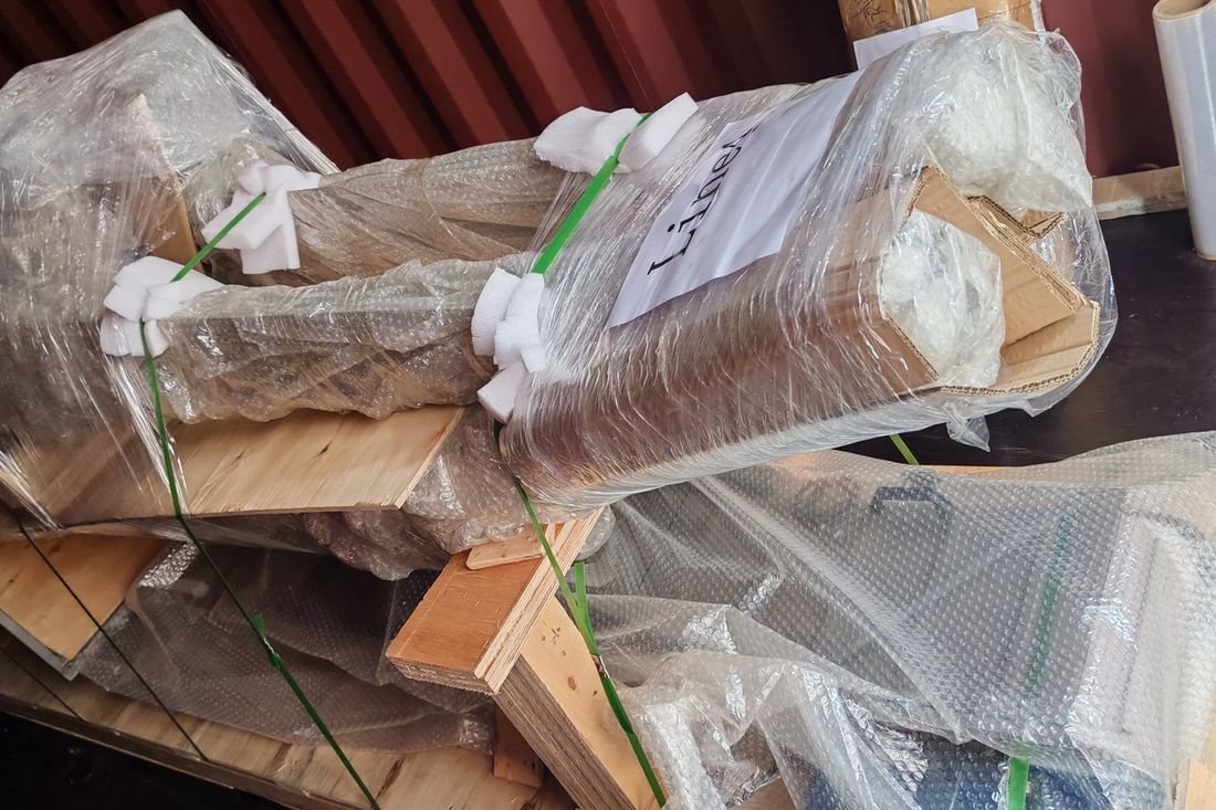 Oral-pouch line container-shipment photo