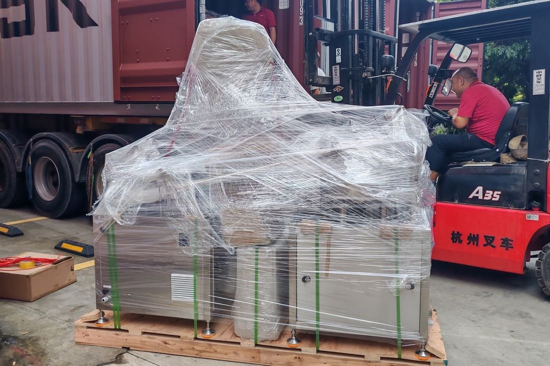 Oral-pouch line container-shipment photo