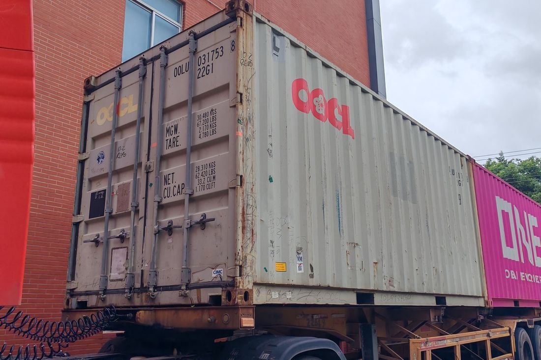 Oral-pouch line container-shipment photo