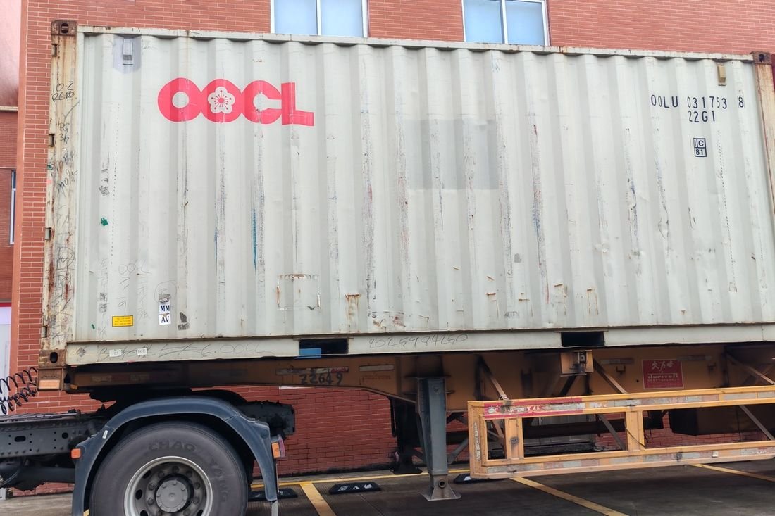Oral-pouch line container-shipment photo