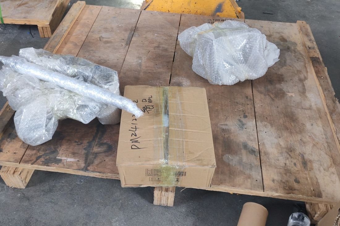 Oral-pouch line container-shipment photo