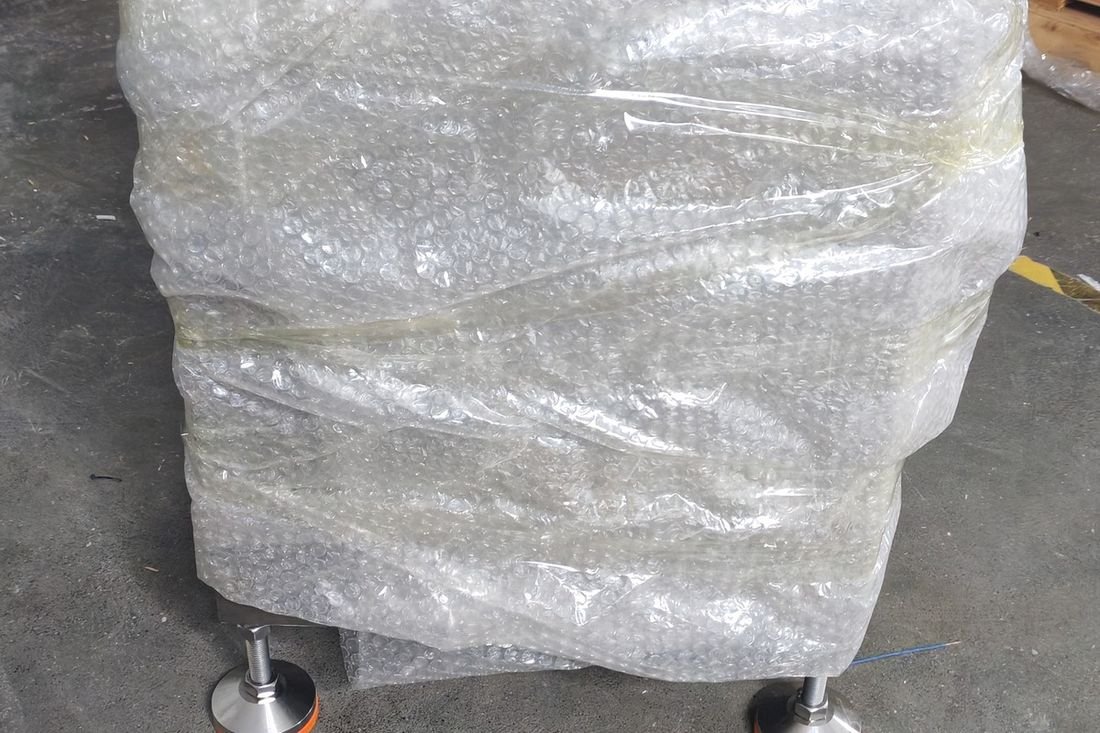 Oral-pouch line container-shipment photo