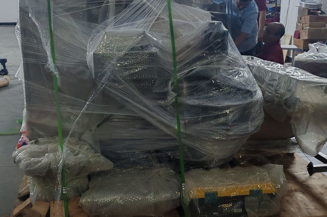 Oral-pouch line container-shipment photo