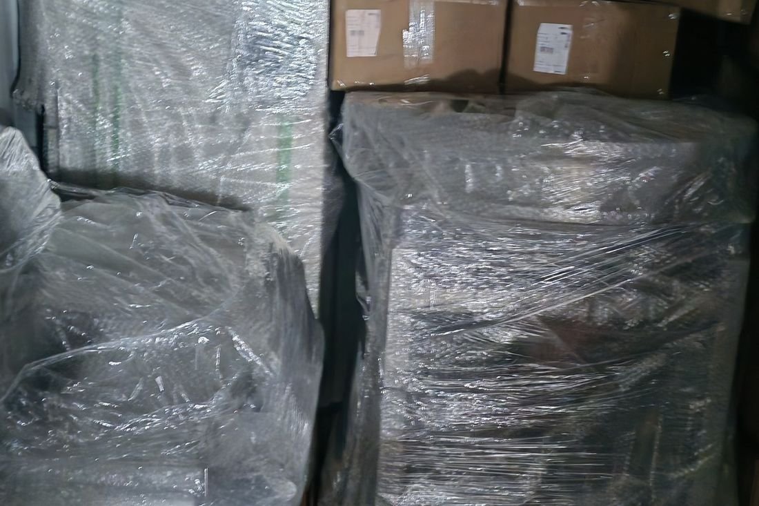 Oral-pouch line container-shipment photo