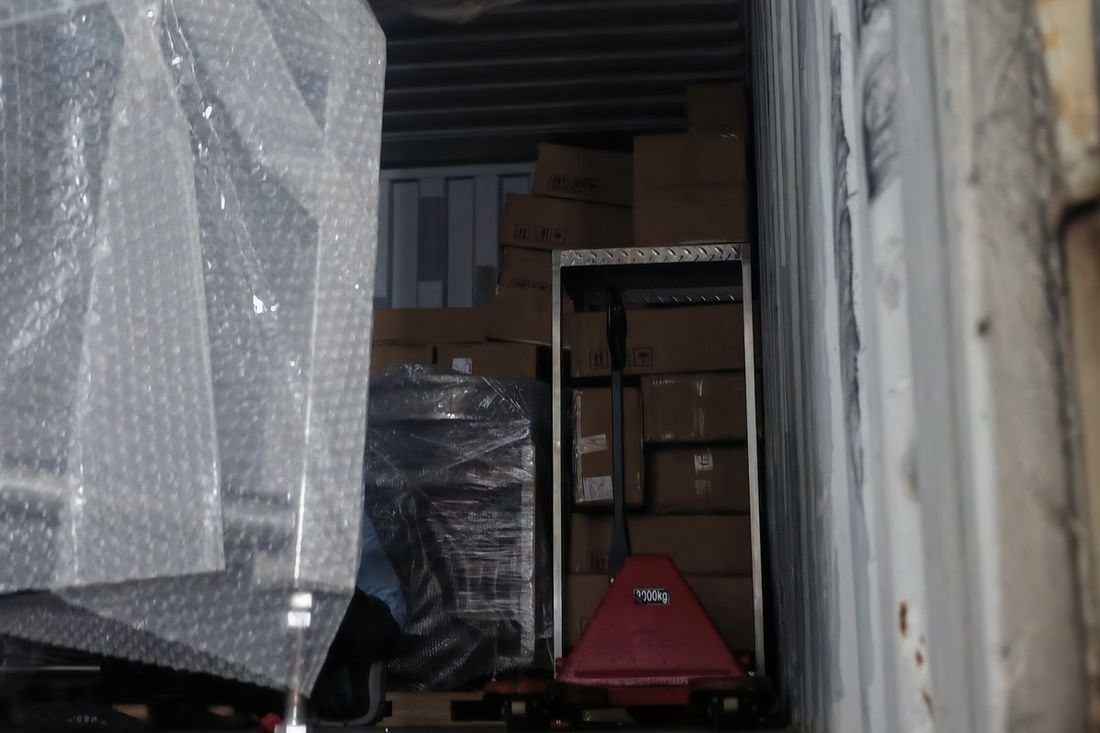 Oral-pouch line container-shipment photo