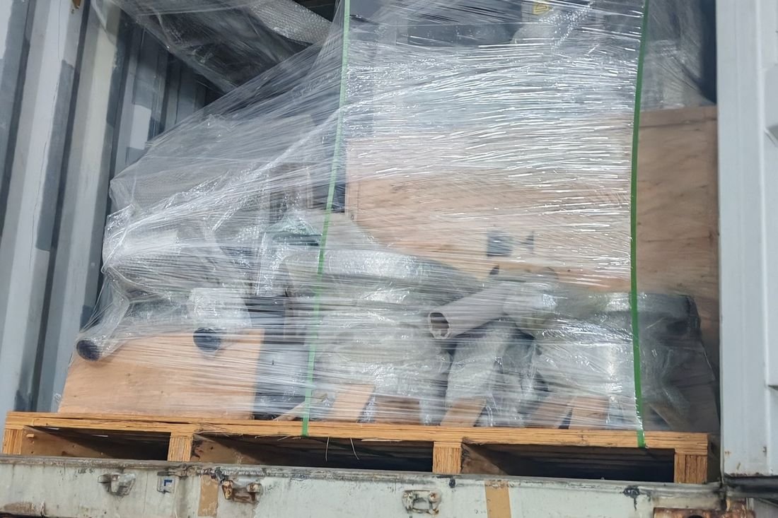Oral-pouch line container-shipment photo