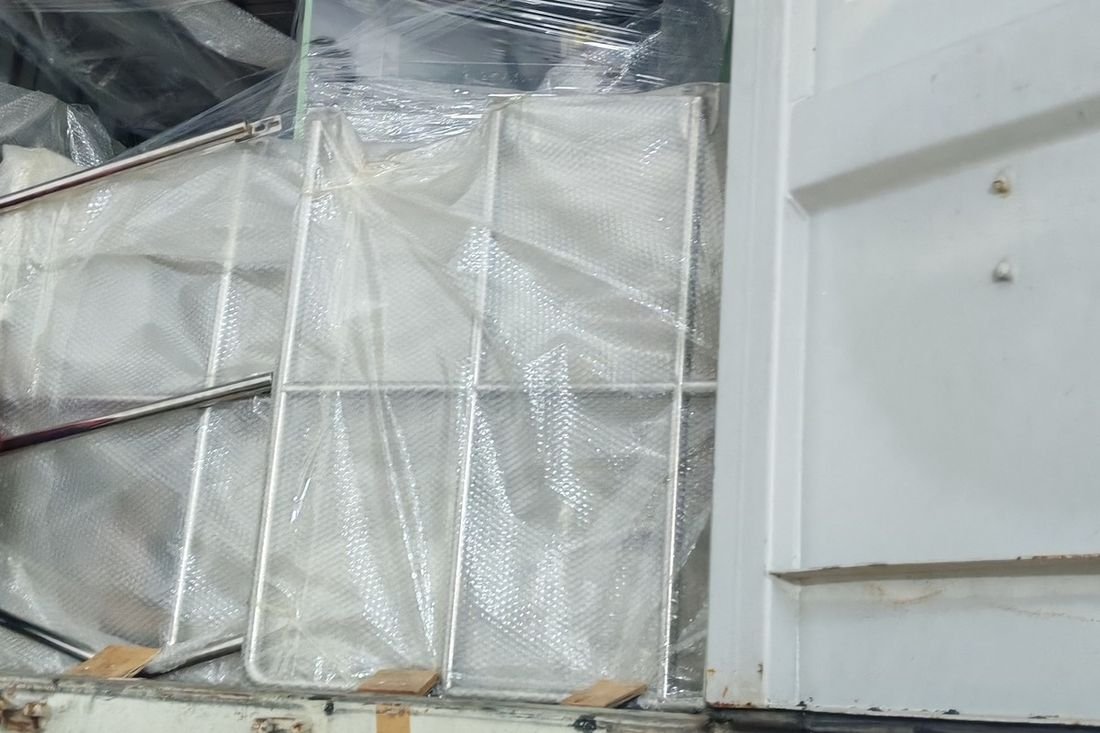 Oral-pouch line container-shipment photo
