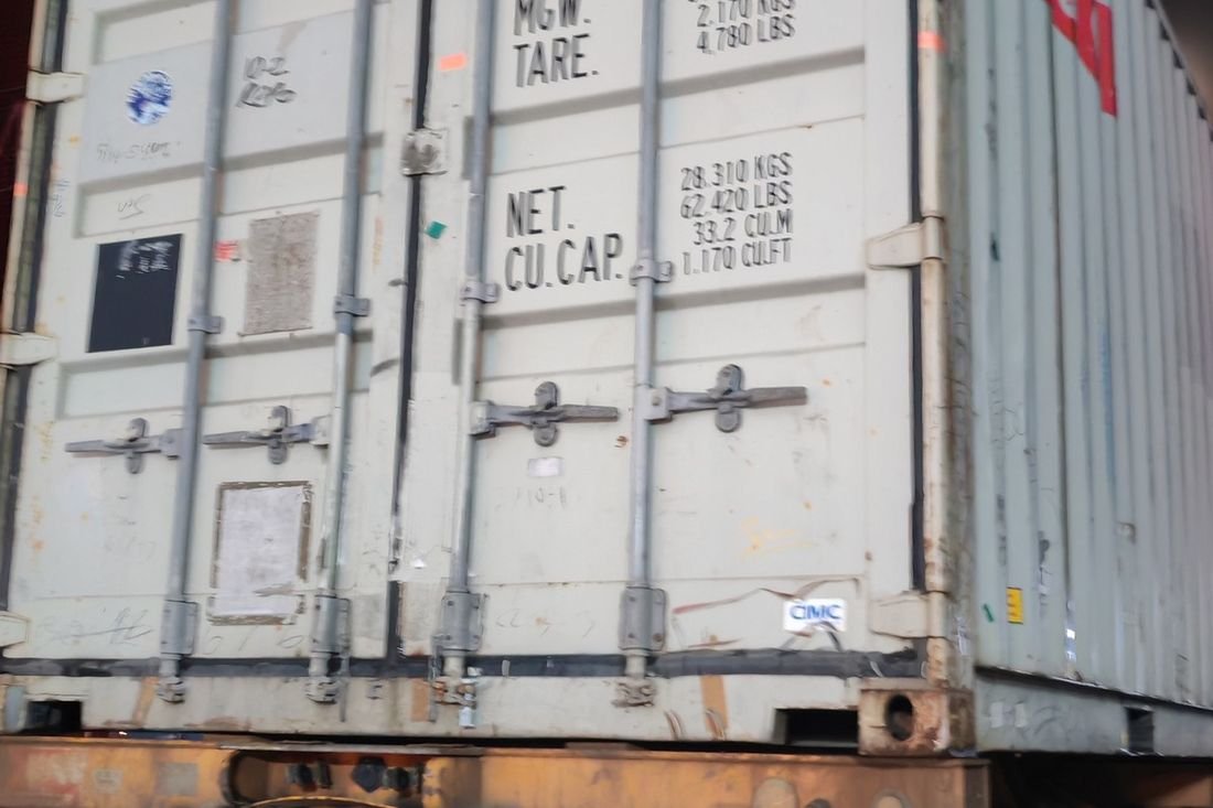 Oral-pouch line container-shipment photo